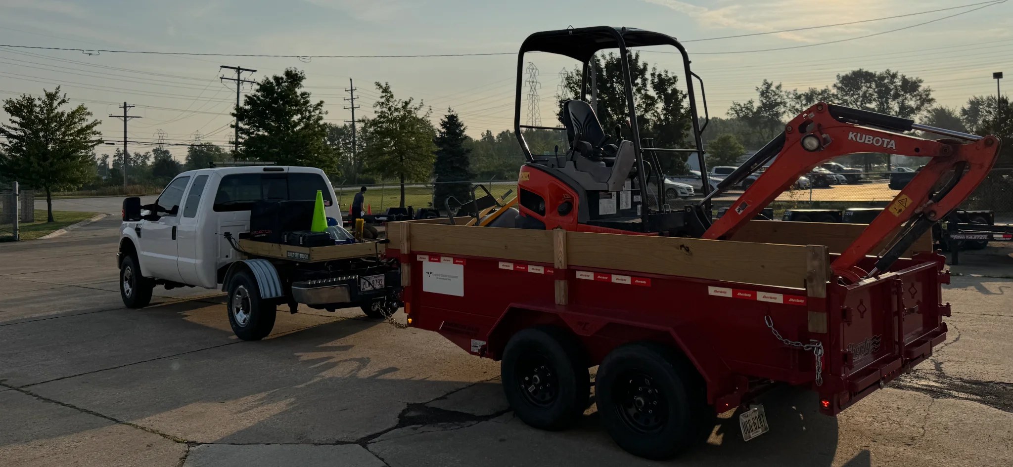 Longhorns truck and trailer with Kubota excavator